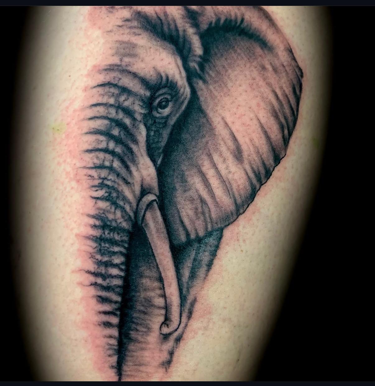 Large scale black and grey tattoo by professional artist